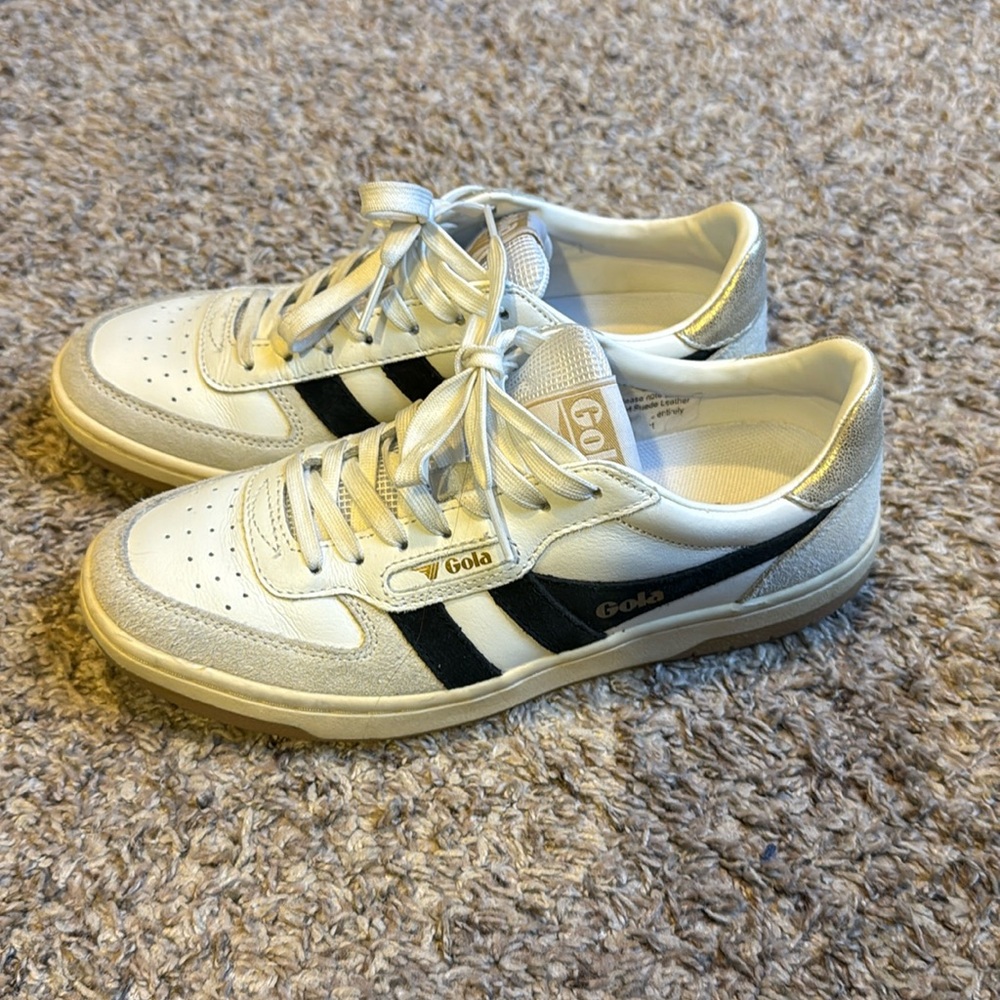 Women’s Gola size 6.  White with navy and gold detail.  Almost new! Run big.